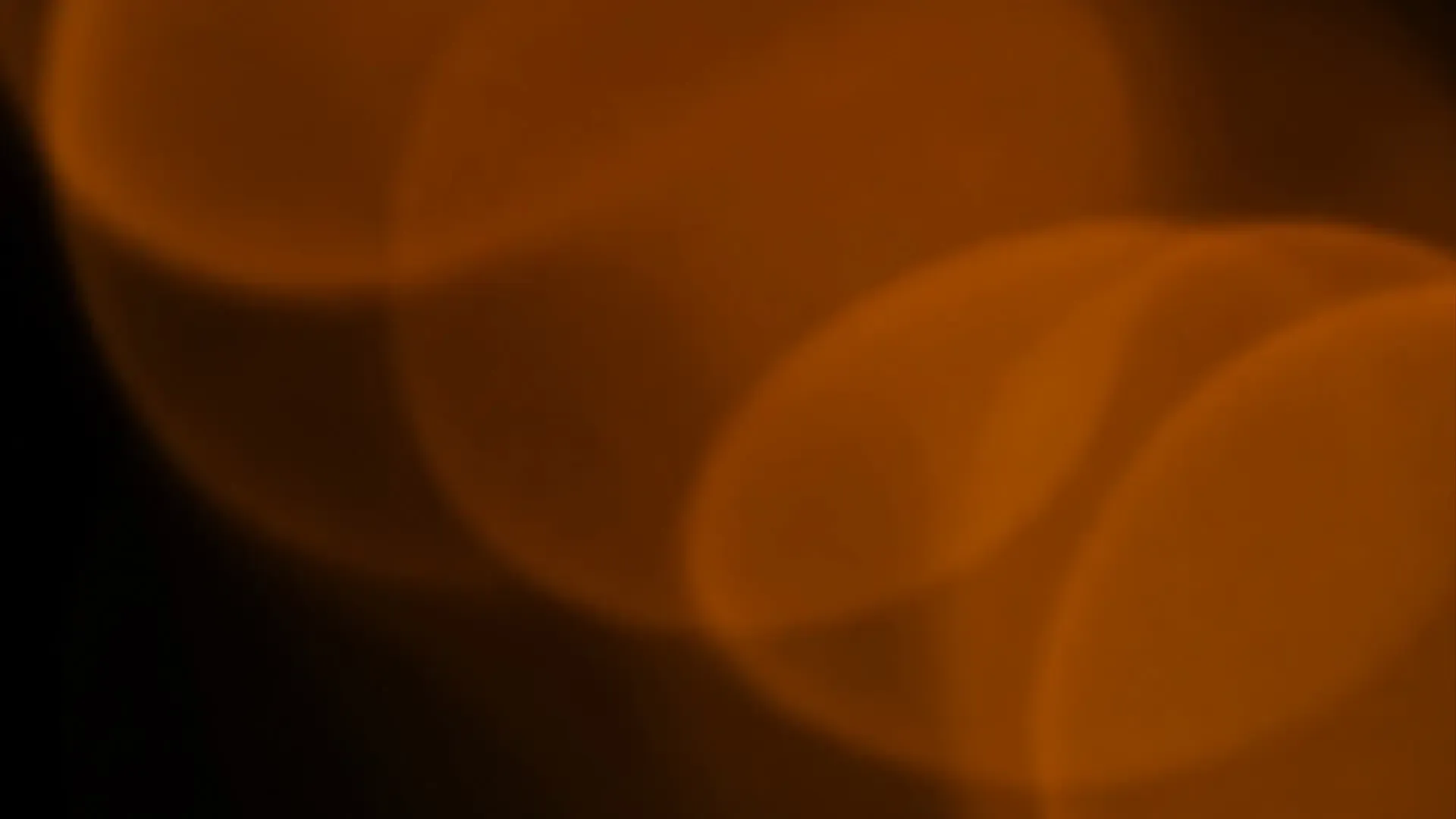 Soft Orange Glow Bokeh Overlay for Elegant Video Projects